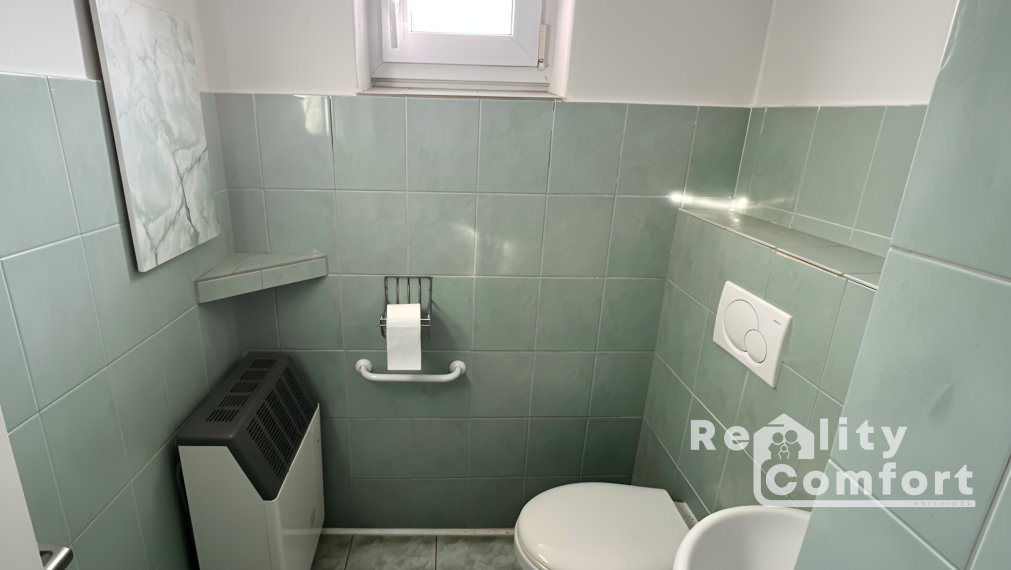 Priestranný dom s garážou a veľkou záhradou