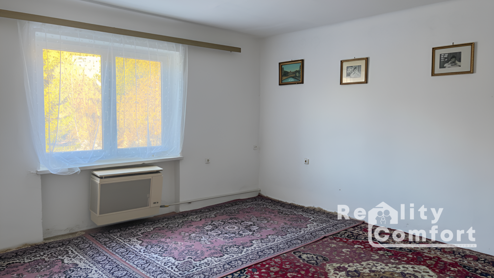 Priestranný dom s garážou a veľkou záhradou