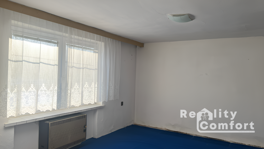 Priestranný dom s garážou a veľkou záhradou